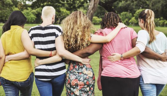 Friends having fun together women standing together